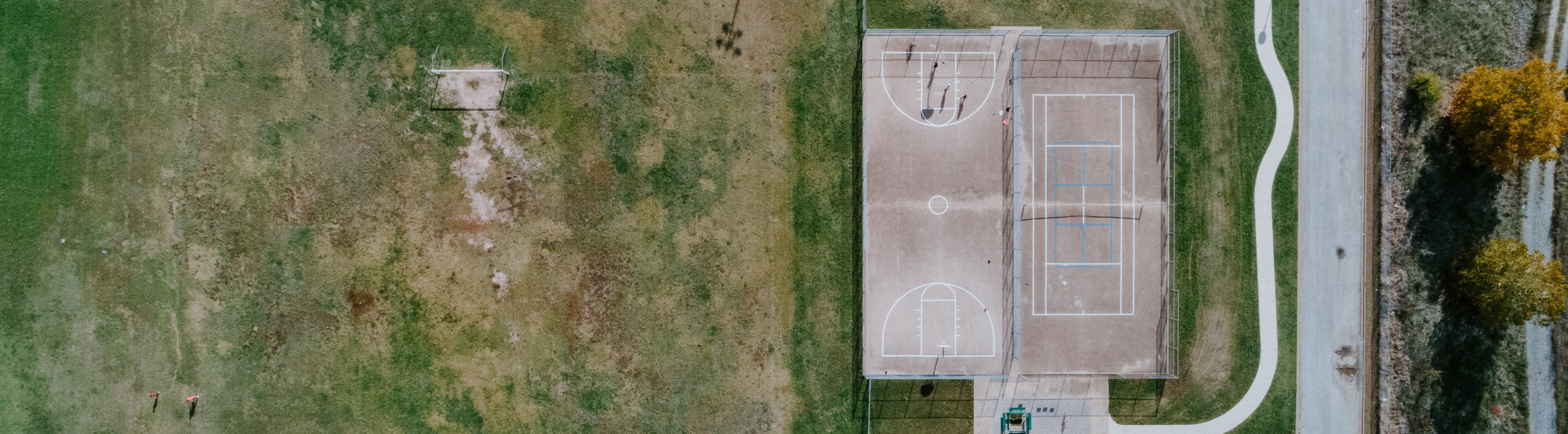 Aerial view of Hallmark Park, showing soccer field, basketball court, and tennis court.